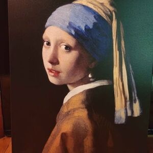 Elegant Portrait Canvas Art with Blue and Brown Tones